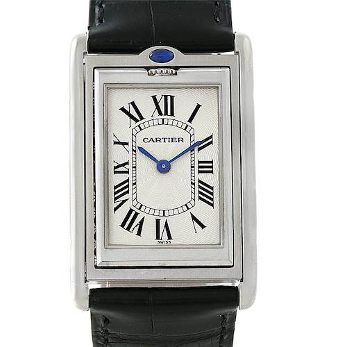 This image shows a frontal view of the Cartier Tank Basculante W1011358 Men's Stainless Steel Silver Dial W1011358 Men's Stainless Steel Silver Dial watch, displaying its face and part of its black strap.