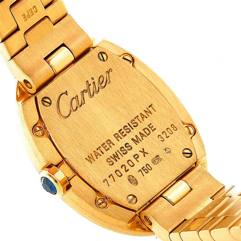 The image shows the back case and part of the bracelet of a Cartier Baignoire W8000008 Women's Yellow Gold Silver Dial W8000008 Women's Yellow Gold Silver Dial watch.