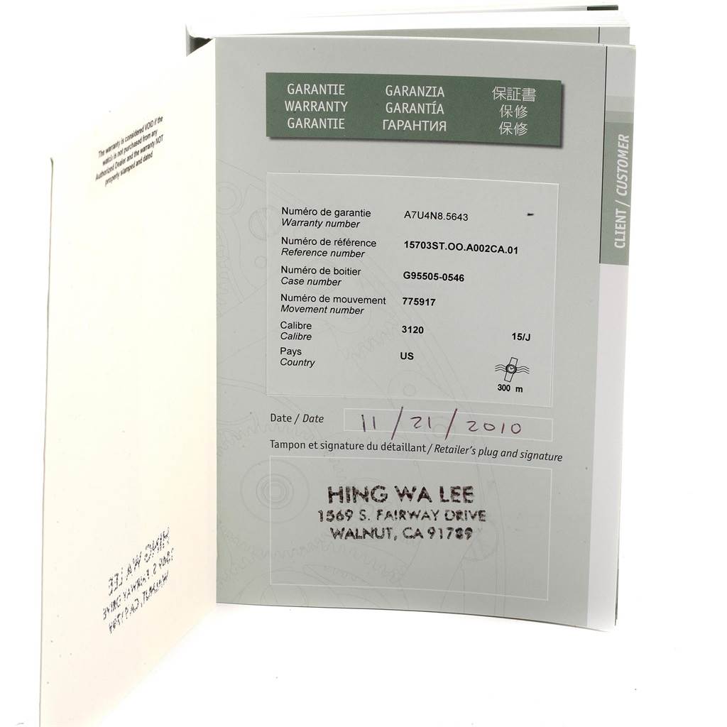 This image shows the warranty card booklet for the Audemars Piguet Royal Oak Offshore 15703ST.OO.A002CA.01 Men's Stainless Steel Black Dial 15703ST.OO.A002CA.01 Men's Stainless Steel Black Dial model, displaying warranty details and dealer information.