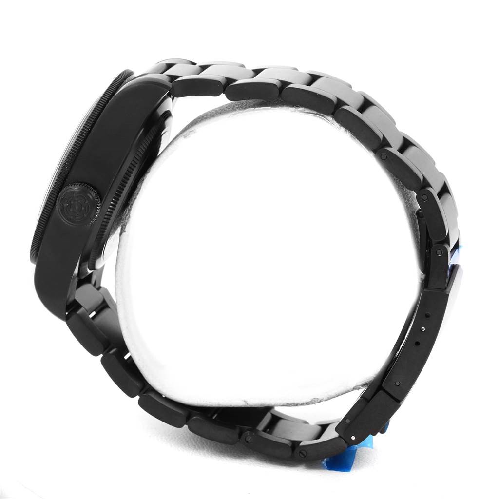 The image shows a side view of the Tudor Heritage Black Bay 79230DK Men's Stainless Steel Black Dial 79230DK Men's Stainless Steel Black Dial watch, highlighting the case, bracelet, and crown.