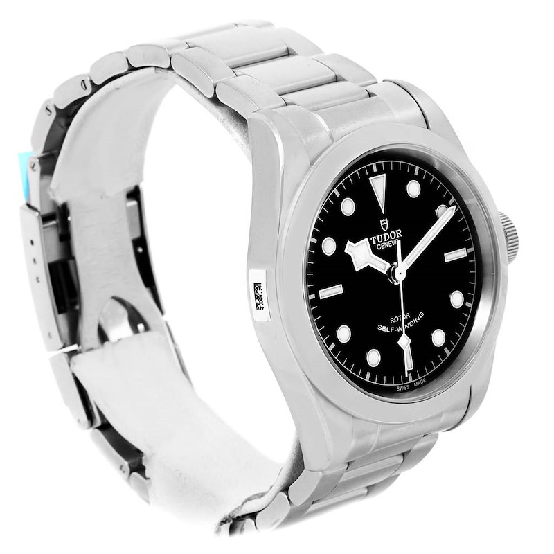 The image shows a side and partial front view of the Tudor Heritage Black Bay 79540 Men's Stainless Steel Black Dial 79540 Men's Stainless Steel Black Dial watch, including its black dial and metal bracelet.