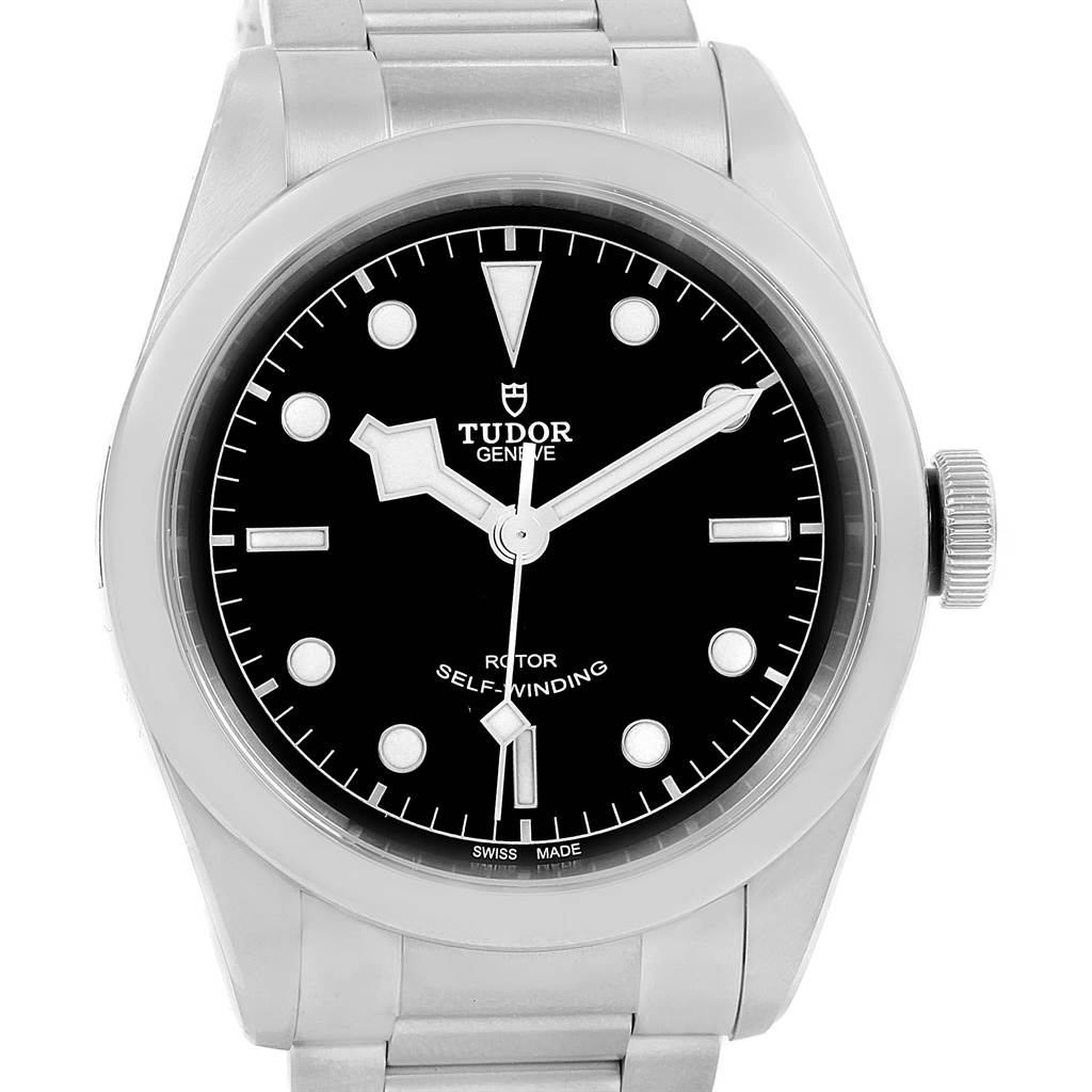 The image shows the front view of a Tudor Heritage Black Bay 79540 Men's Stainless Steel Black Dial 79540 Men's Stainless Steel Black Dial model watch, including its dial and part of its bracelet.