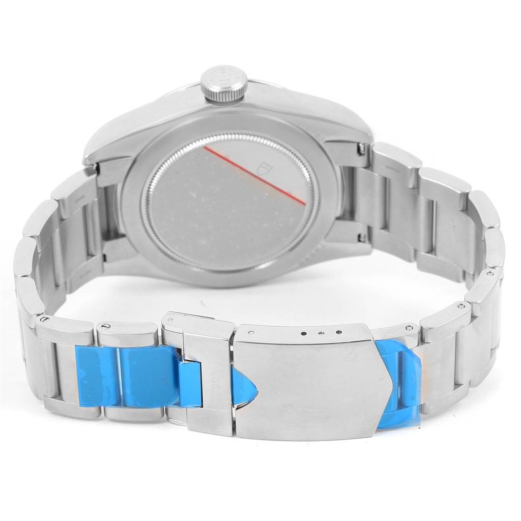 This image shows the back of the Tudor Heritage Black Bay 79540 Men's Stainless Steel Black Dial 79540 Men's Stainless Steel Black Dial watch, focusing on the case back, crown, and partially closed bracelet with a clasp.