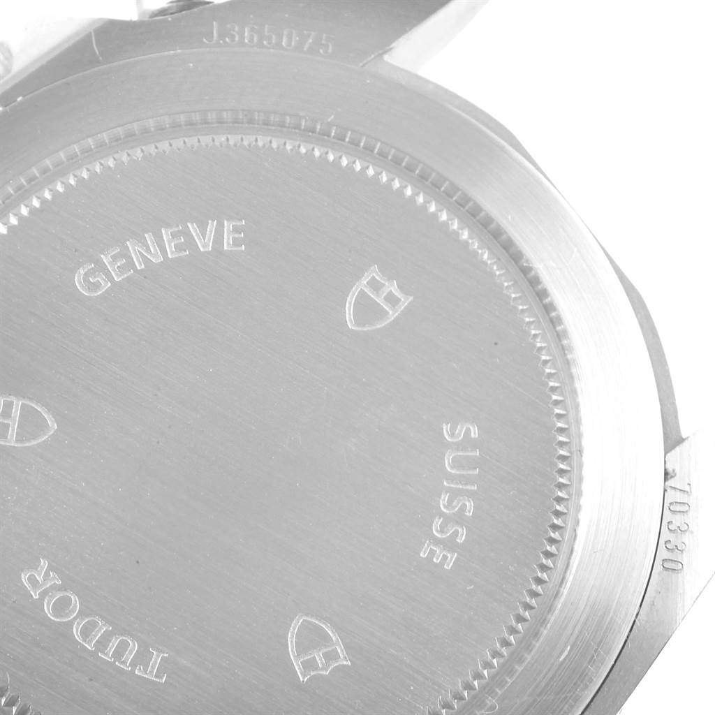 The image shows the engraved case back and lugs of a Tudor Heritage Chrono 70330N Men's Stainless Steel Grey Dial 70330N Men's Stainless Steel Grey Dial watch.