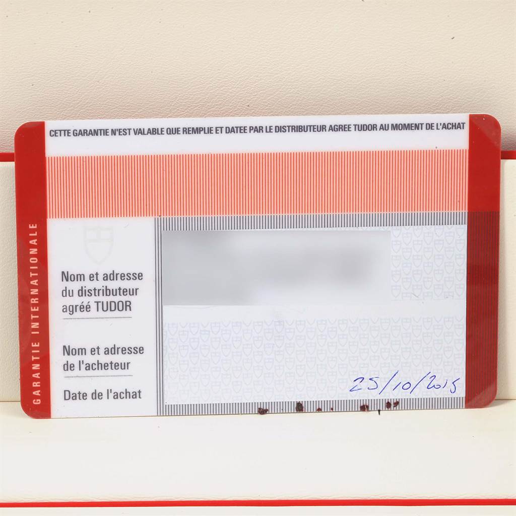 This image shows the international warranty card for the Tudor Heritage Chrono 70330N Men's Stainless Steel Grey Dial 70330N Men's Stainless Steel Grey Dial watch, dated 25/10/2015.