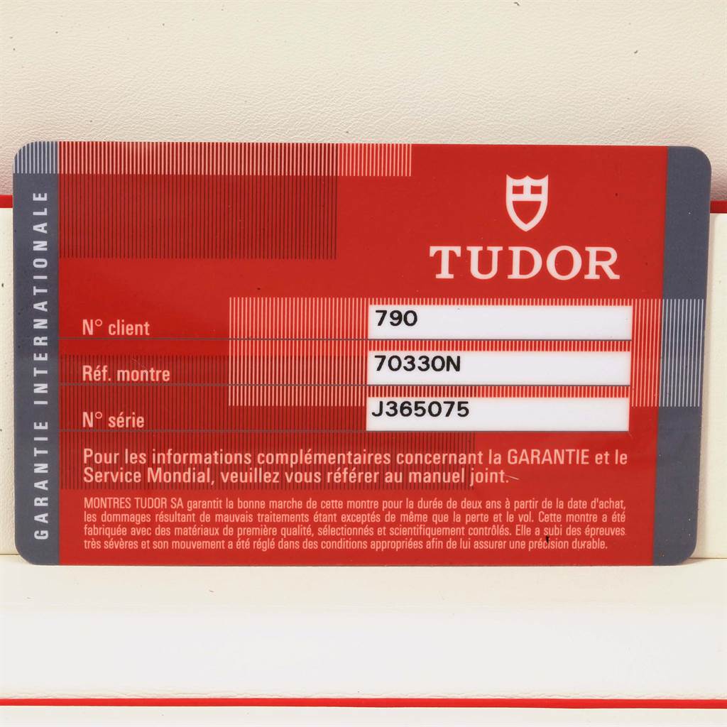 The image shows an international warranty card for a Tudor Heritage Chrono 70330N Men's Stainless Steel Grey Dial 70330N Men's Stainless Steel Grey Dial model watch, with reference number 70330N.