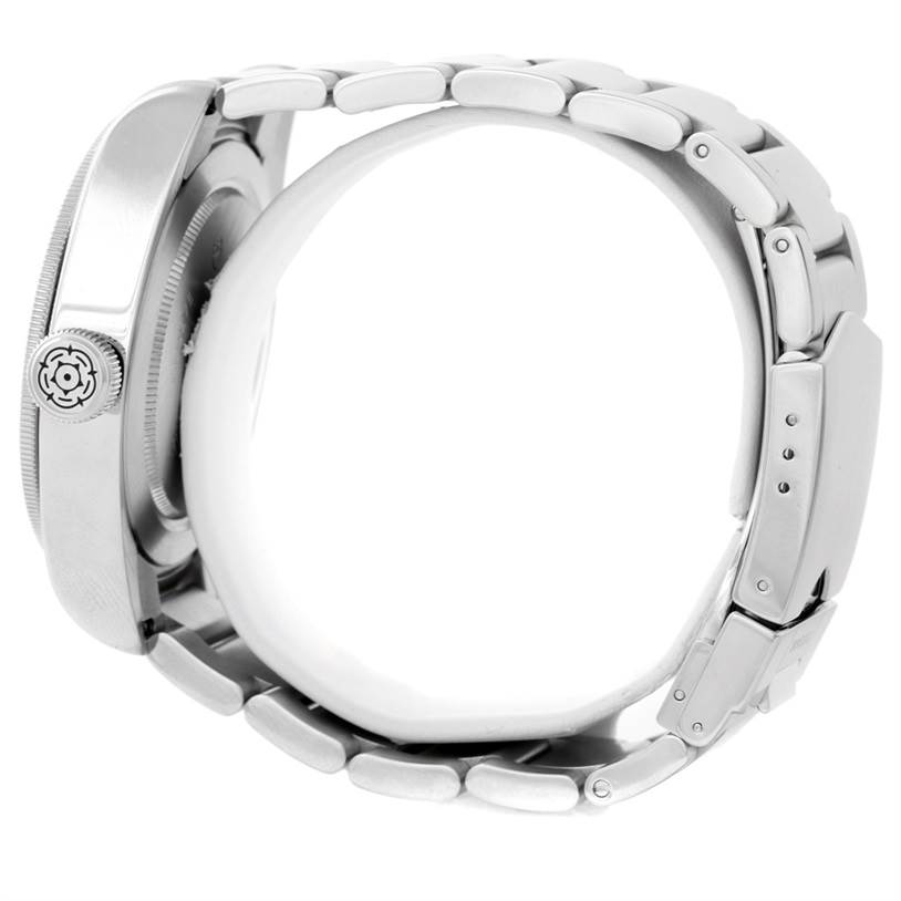 The image shows a side profile of the Tudor Heritage Black Bay 79220 Men's Stainless Steel Black Dial 79220 Men's Stainless Steel Black Dial watch, focusing on its case, crown, and bracelet.