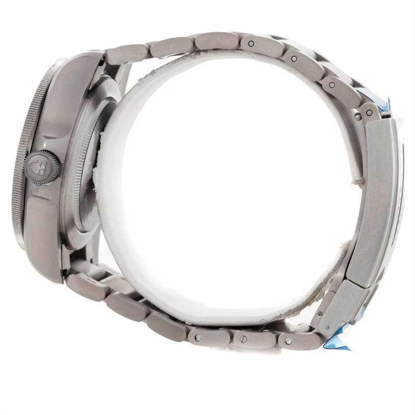 The image shows a side view of the Tudor Pelagos 25500TN Men's Titanium Black Dial 25500TN Men's Titanium Black Dial watch, highlighting its case, crown, and metal bracelet.