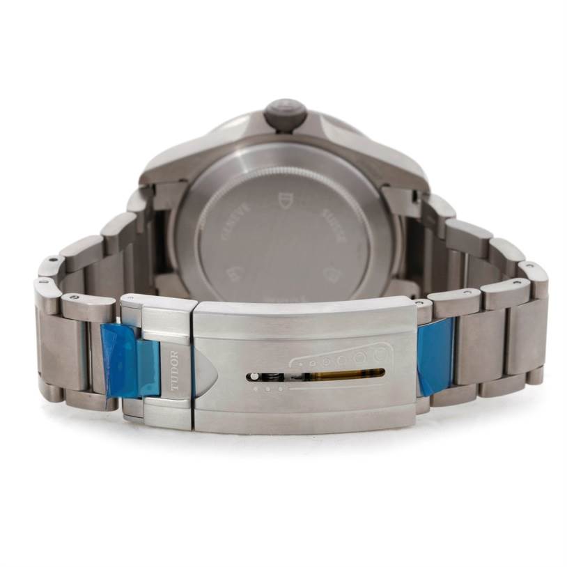 The image shows the backside and clasp of a Tudor Pelagos 25500TN Men's Titanium Black Dial 25500TN Men's Titanium Black Dial watch, highlighting the bracelet and case back.