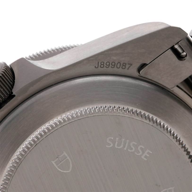 This image shows a close-up angle of the back case and a part of the bracelet of a Tudor Pelagos 25500TN Men's Titanium Black Dial 25500TN Men's Titanium Black Dial watch.