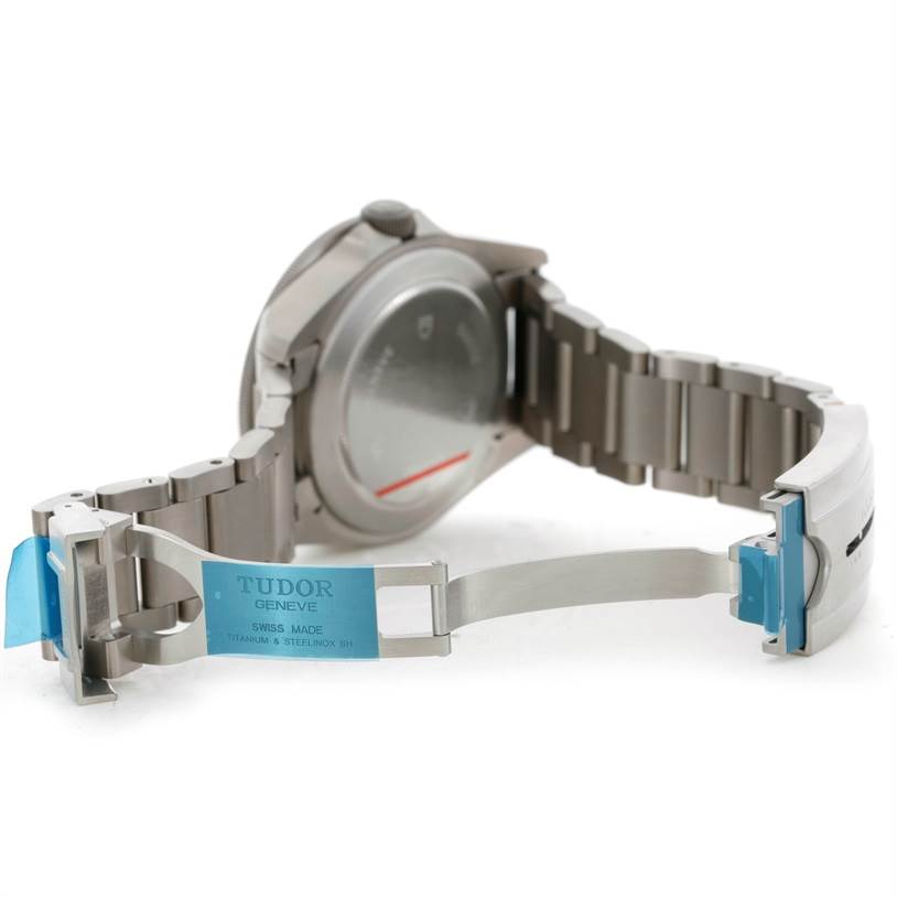 The image shows the back and partially open titanium bracelet of a Tudor Pelagos 25500TN Men's Titanium Black Dial 25500TN Men's Titanium Black Dial watch.