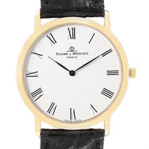 The image shows a front view of the Baume & Mercier Classima 95612 Men's Yellow Gold White Dial 95612 Men's Yellow Gold White Dial watch, highlighting its dial, Roman numerals, and black leather strap.