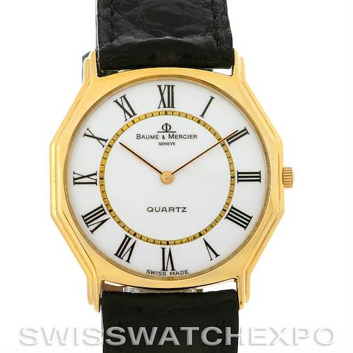 The image shows a frontal view of a Vintage Baume Mercier 14k Yellow Gold Quartz Watch by Baume & Mercier 1505735 Men's Yellow Gold White Dial 1505735 Men's Yellow Gold White Dial, highlighting the dial and leather strap.