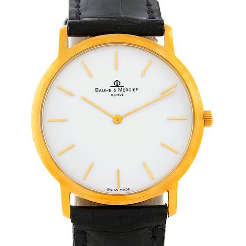 This image shows a front view of a Baume & Mercier Classima Men's Yellow Gold White Dial Men's Yellow Gold White Dial watch with a gold case and black leather strap.