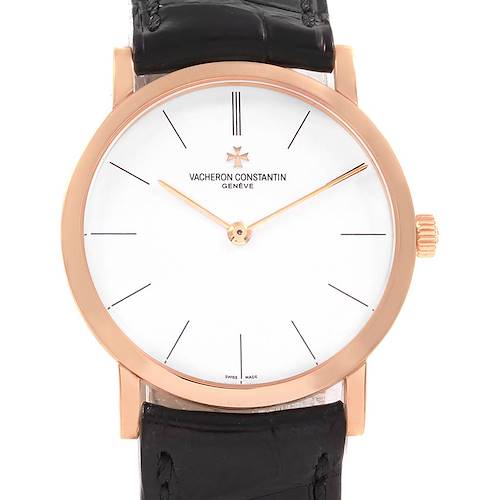 The image shows a front angle of the Patrimony model by Vacheron Constantin, highlighting the watch face, case, and leather strap.