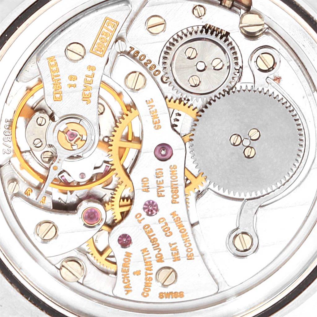 This image shows the intricate inner mechanics and gears of a Vacheron Constantin Patrimony 33093 Men's White Gold White Dial 33093 Men's White Gold White Dial watch from a close-up angle.