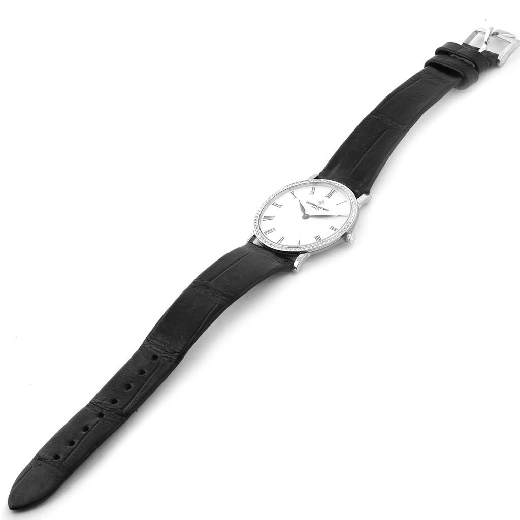 The Vacheron Constantin Patrimony 33093 Men's White Gold White Dial 33093 Men's White Gold White Dial watch is displayed flat in full view, showcasing its face, case, and black leather strap.