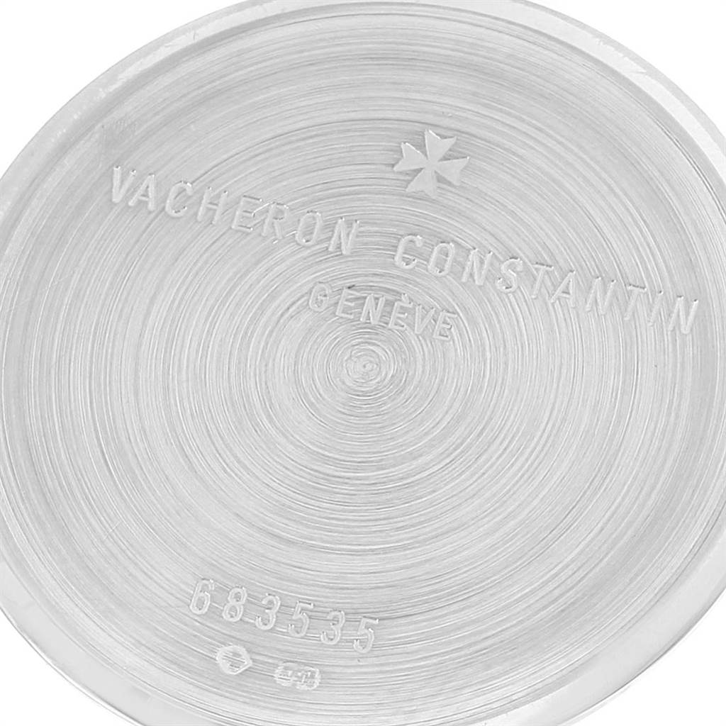 The image shows the engraved case back of a Vacheron Constantin Patrimony 33093 Men's White Gold White Dial 33093 Men's White Gold White Dial watch from a close-up angle.