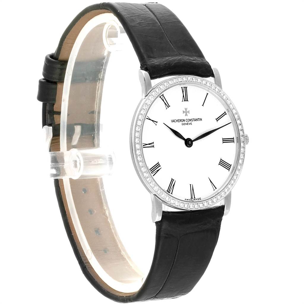 The image shows a Vacheron Constantin Patrimony 33093 Men's White Gold White Dial 33093 Men's White Gold White Dial watch at an angle highlighting its face, bezel, and leather strap.