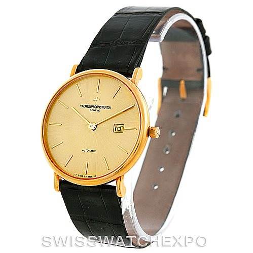 This image shows a side angle of a vintage Vacheron Constantin watch, highlighting its gold case, black leather strap, and dial with date window.