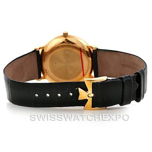 This image shows the back view of a Vintage Vacheron Constantin watch, highlighting the leather strap and gold buckle.