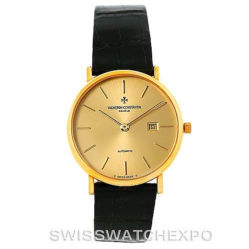 The image shows a frontal view of a Vacheron Constantin Vintage 48002 Men's Yellow Gold Champagne Dial 48002 Men's Yellow Gold Champagne Dial model watch with a gold dial, black leather strap, and an automatic movement.