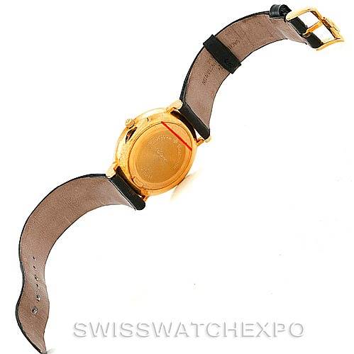 This image shows the back case and leather strap of the Vacheron Constantin Vintage 48002 Men's Yellow Gold Champagne Dial 48002 Men's Yellow Gold Champagne Dial watch.