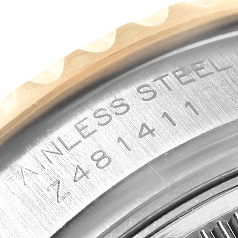 The image shows a close-up of the stainless steel case back part of the Rolex Yacht-Master 169623 Women's Steel and Gold (two tone) White Dial 169623 Women's Steel and Gold (two tone) White Dial watch with visible engravings.