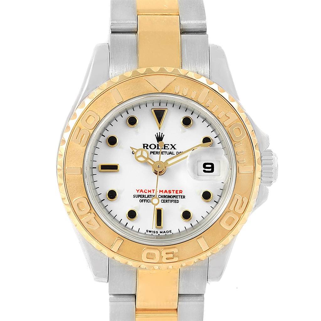 The image shows a front view of a Rolex Yacht-Master 169623 Women's Steel and Gold (two tone) White Dial 169623 Women's Steel and Gold (two tone) White Dial watch, highlighting its dial, bezel, and part of the bracelet.