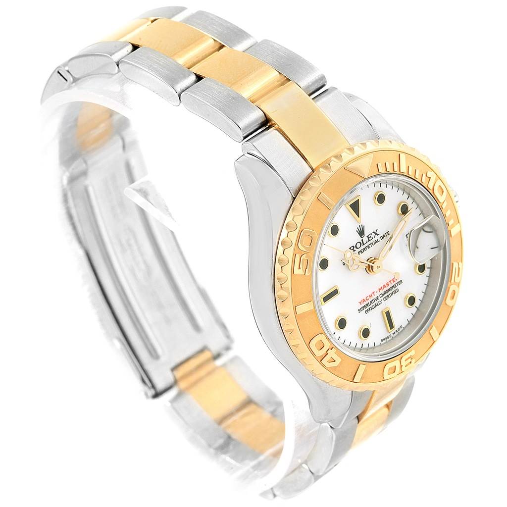 This image shows a side angle view of the Rolex Yacht-Master 169623 Women's Steel and Gold (two tone) White Dial 169623 Women's Steel and Gold (two tone) White Dial watch, highlighting the gold and silver bracelet and the watch face.