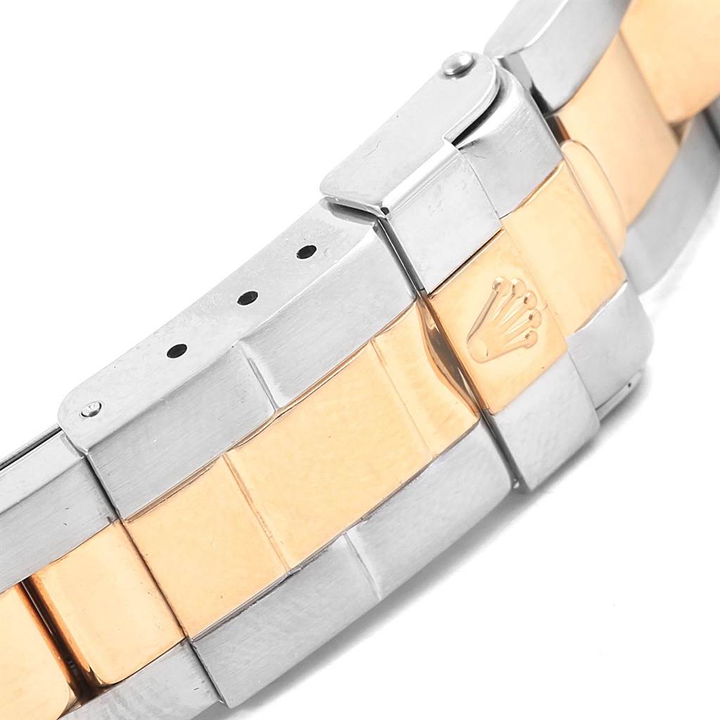 This image shows a close-up of the bracelet of a Rolex Yacht-Master 169623 Women's Steel and Gold (two tone) White Dial 169623 Women's Steel and Gold (two tone) White Dial watch, displaying its two-tone metal links and clasp.