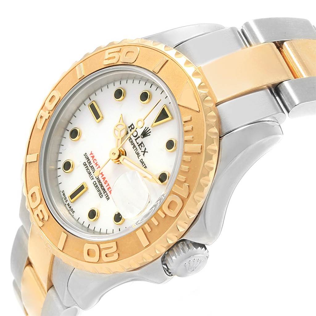 The Rolex Yacht-Master 169623 Women's Steel and Gold (two tone) White Dial 169623 Women's Steel and Gold (two tone) White Dial watch is shown at an angle highlighting its gold bezel, white dial, and part of the bracelet.