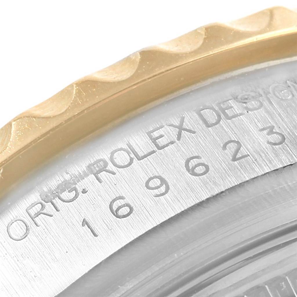 The image shows a close-up angle of the bezel and part of the case of the Rolex Yacht-Master 169623 Women's Steel and Gold (two tone) White Dial 169623 Women's Steel and Gold (two tone) White Dial watch.