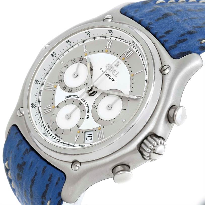 The image shows an angled view of the Ebel 9137241 Stainless Steel Silver Dial 9137241 Stainless Steel Silver Dial Le Modulor Automatic Chronograph Blue Strap Watch 9137241's face and blue strap.