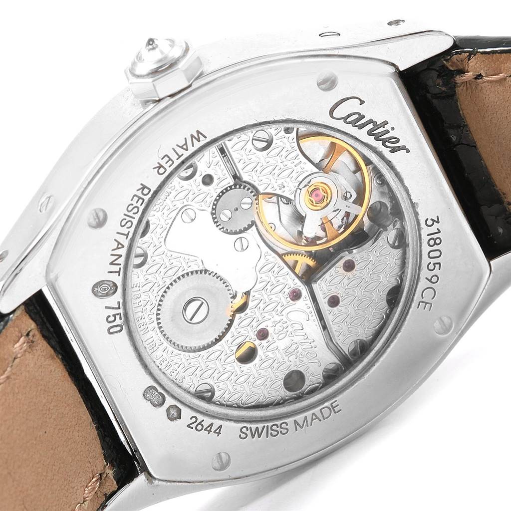 The image shows a close-up of the movement mechanism of a Cartier Tortue WA507231 Women's White Gold Silver Dial WA507231 Women's White Gold Silver Dial watch, viewed from the back.