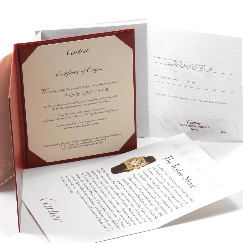 The image shows the Certificate of Origin and additional documentation for the Cartier Tortue WA507231 Women's White Gold Silver Dial WA507231 Women's White Gold Silver Dial watch model.
