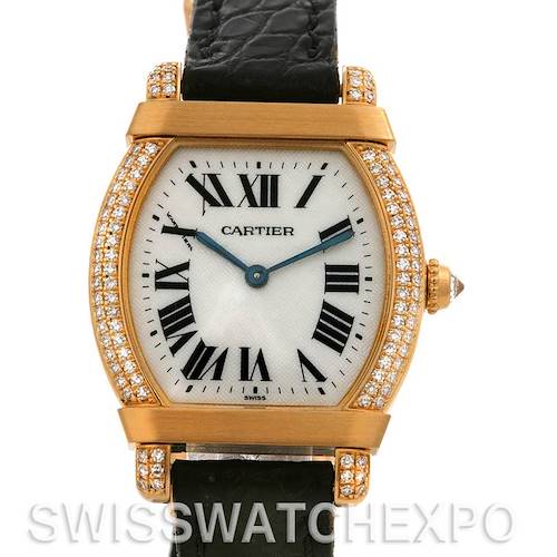 The image shows a front view of a Cartier Tortue Women's Yellow Gold Silver Dial Women's Yellow Gold Silver Dial watch with a gold case, diamond bezel, and a black leather strap.