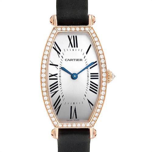 The Cartier Tortue WE400331 Women's Yellow Gold Silver Dial WE400331 Women's Yellow Gold Silver Dial model watch is shown from a top-down angle, displaying the face, bezel adorned with diamonds, and black strap.