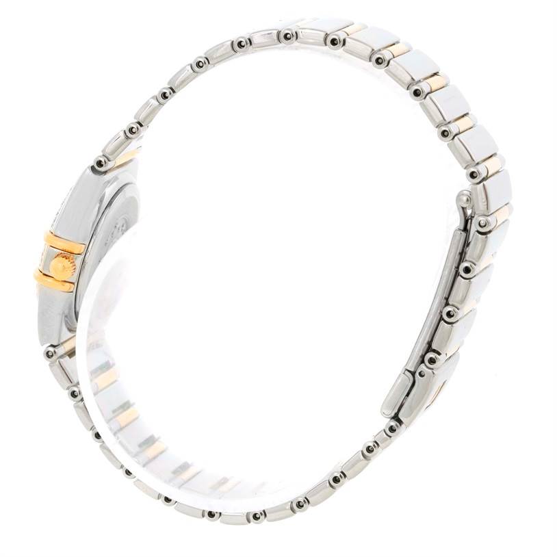 This Omega 1365.75.00 Women's Steel and Gold (two tone) Mother of Pearl Dial 1365.75.00 Women's Steel and Gold (two tone) Mother of Pearl Dial Constellation Mini Steel Yellow Gold Diamond Watch 1365.75.00 is shown from a side angle, highlighting the bracelet and crown details.