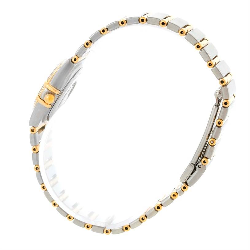 This image shows a side view of the Omega 1267.75.00 Women's Steel and Gold (two tone) Mother of Pearl Dial 1267.75.00 Women's Steel and Gold (two tone) Mother of Pearl Dial Constellation My Choice Mini Steel Gold Diamond Watch 1267.75.00, highlighting its metal and gold bracelet.