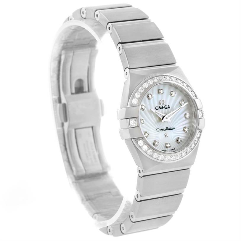 The image shows an Omega 123.15.27.60.55.002 Women's Stainless Steel Mother of Pearl Dial 123.15.27.60.55.002 Women's Stainless Steel Mother of Pearl Dial Constellation 27mm Diamond Ladies Watch model 123.15.27.60.55.002 from a front-left angle, highlighting the dial, bezel, and bracelet.