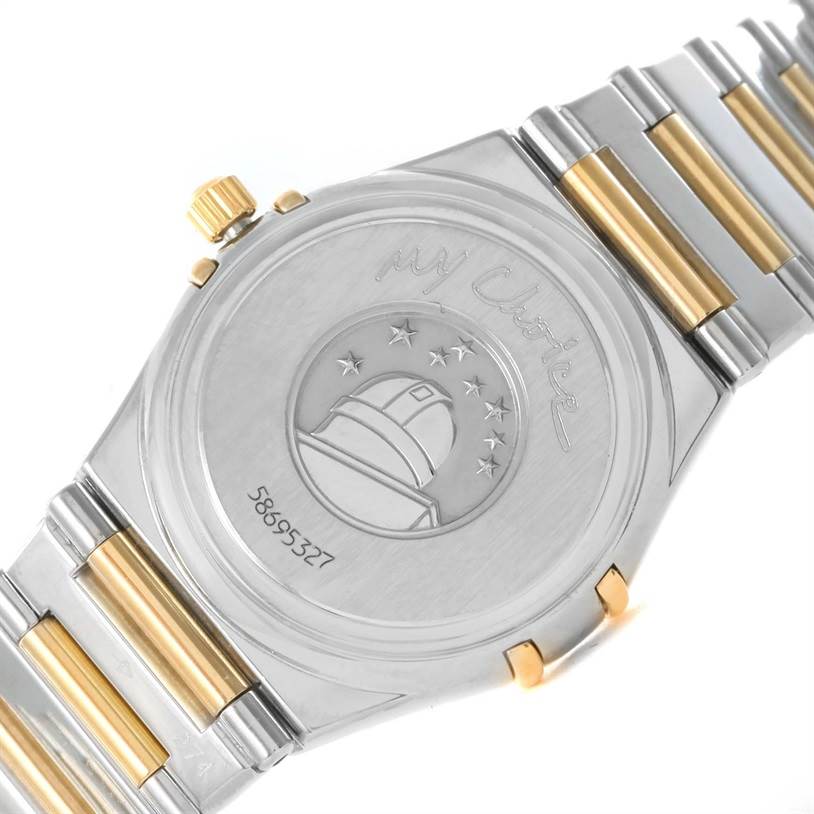 The image shows the back view of the Omega 1376.75.00 Women's Steel and Gold (two tone) Mother of Pearl Dial 1376.75.00 Women's Steel and Gold (two tone) Mother of Pearl Dial Constellation My Choice Steel Yellow Gold Diamond Watch 1376.75.00, featuring its case back and bracelet.