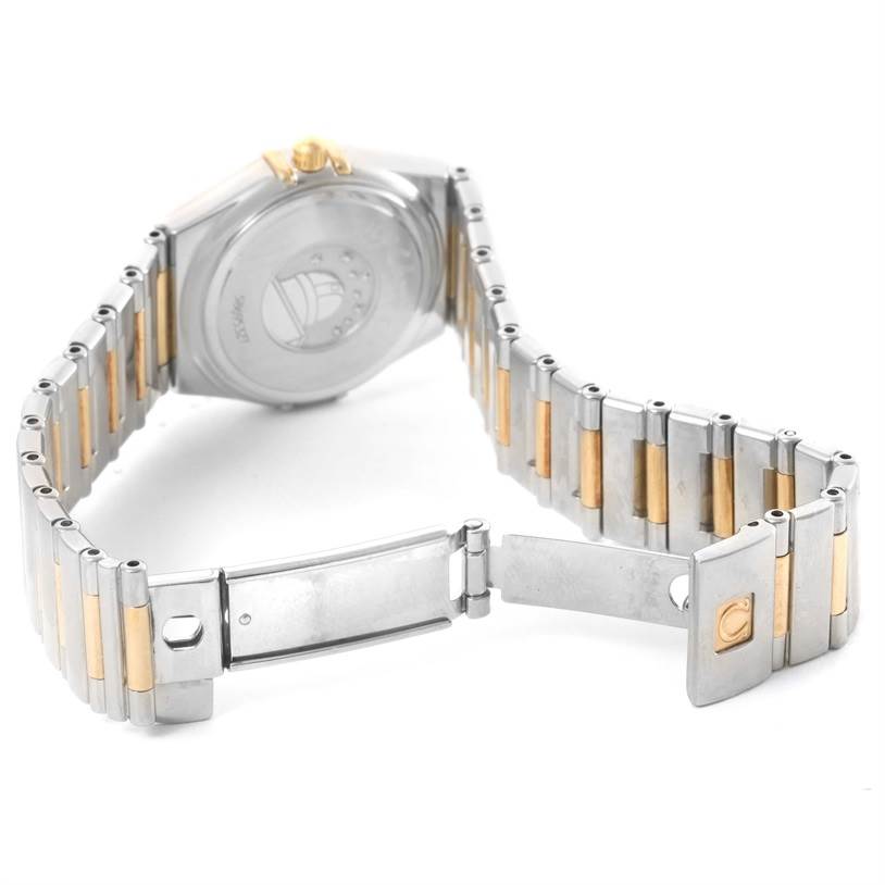 The image shows the back and partially open clasp of the Omega 1376.75.00 Women's Steel and Gold (two tone) Mother of Pearl Dial 1376.75.00 Women's Steel and Gold (two tone) Mother of Pearl Dial Constellation My Choice Steel Yellow Gold Diamond Watch 1376.75.00.