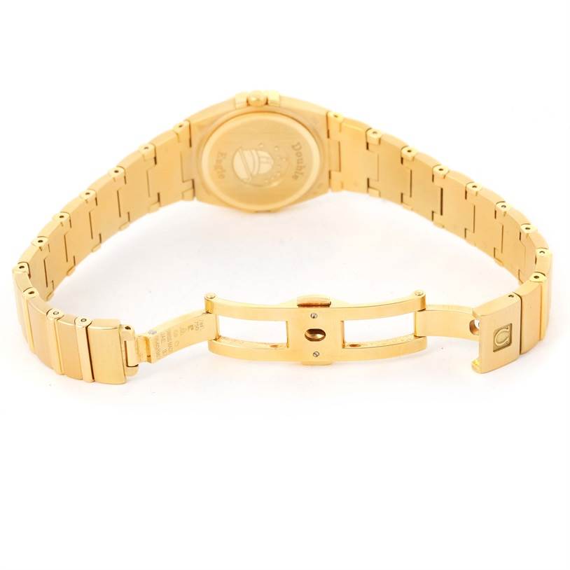 The image shows the back and bracelet of the Omega 1189.75.00 Women's Yellow Gold Mother of Pearl Dial 1189.75.00 Women's Yellow Gold Mother of Pearl Dial Constellation Double Eagle Yellow Gold Diamond Watch 1189.75.00.
