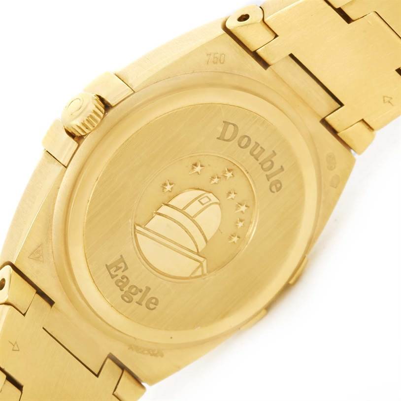 This image shows the back case and part of the bracelet of the Omega 1189.75.00 Women's Yellow Gold Mother of Pearl Dial 1189.75.00 Women's Yellow Gold Mother of Pearl Dial Constellation Double Eagle Yellow Gold Diamond Watch 1189.75.00.