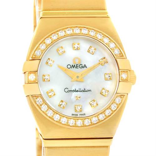 The image shows the face and top part of the strap of the Omega 1189.75.00 Women's Yellow Gold Mother of Pearl Dial 1189.75.00 Women's Yellow Gold Mother of Pearl Dial Constellation Double Eagle Yellow Gold Diamond Watch model 1189.75.00.