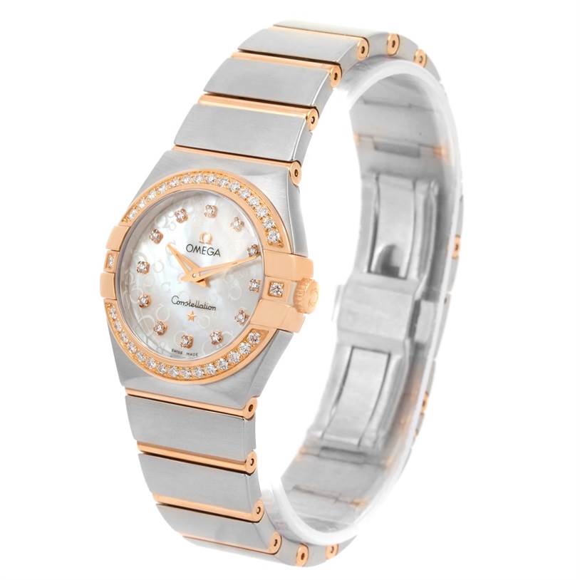 The image shows an Omega 123.25.27.60.55.009 Women's Steel and Gold (two tone) Mother of Pearl Dial 123.25.27.60.55.009 Women's Steel and Gold (two tone) Mother of Pearl Dial Constellation Diamond Steel Rose Gold Watch 123.25.27.60.55.009 from a tilted front angle, displaying the dial, bezel, and bracelet.