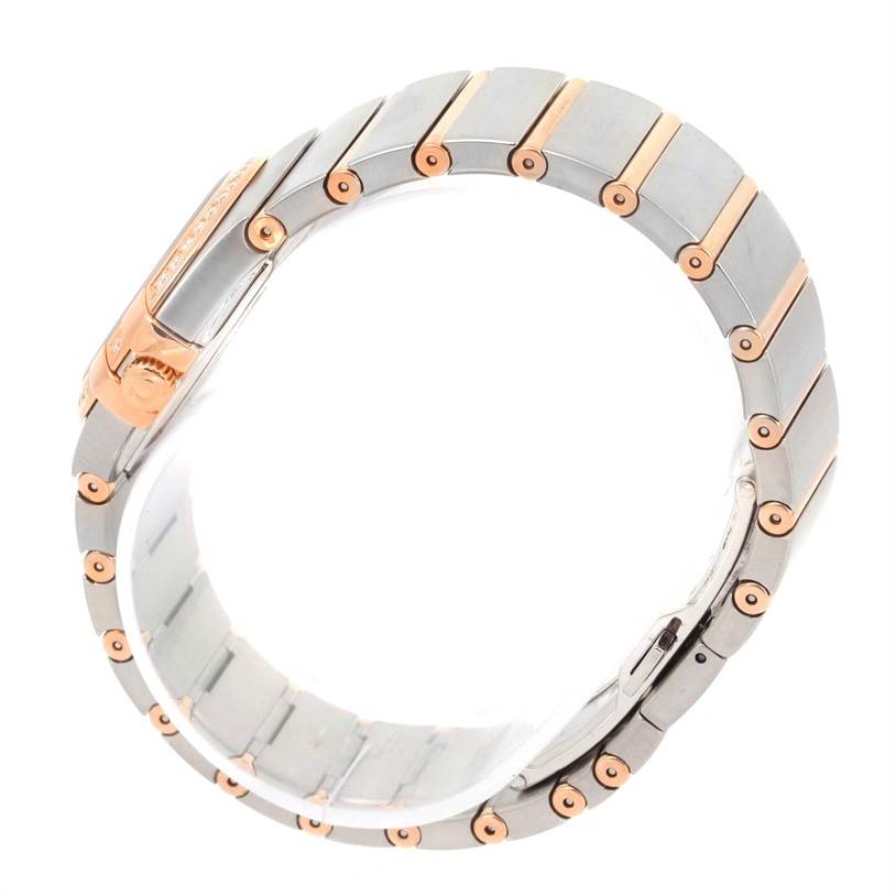 The image shows a side view of the Omega 123.25.27.60.55.009 Women's Steel and Gold (two tone) Mother of Pearl Dial 123.25.27.60.55.009 Women's Steel and Gold (two tone) Mother of Pearl Dial Constellation Diamond Steel Rose Gold Watch 123.25.27.60.55.009 focusing on its bracelet.