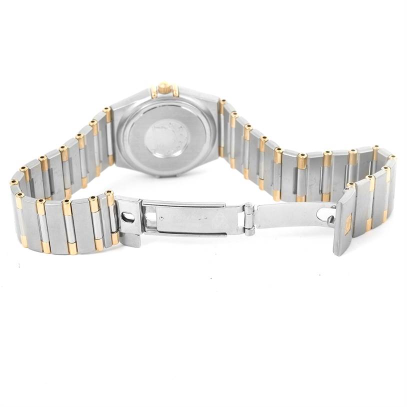 The image shows the back and the partially opened clasp of the Omega 1376.75.00 Women's Steel and Gold (two tone) Mother of Pearl Dial 1376.75.00 Women's Steel and Gold (two tone) Mother of Pearl Dial Constellation My Choice Steel Yellow Gold Diamond Watch 1376.75.00.