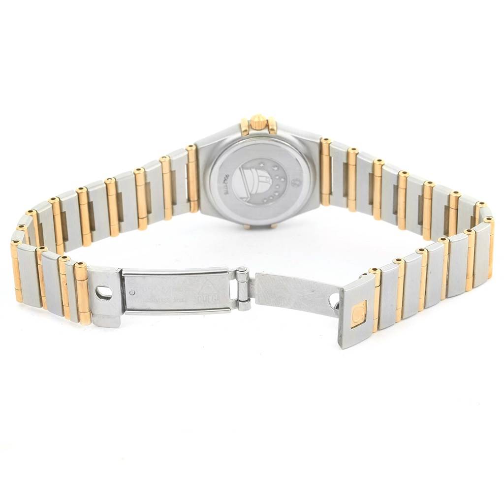 The image shows the back and clasp of the Omega 1267.75.00 Women's Steel and Gold (two tone) Mother of Pearl Dial 1267.75.00 Women's Steel and Gold (two tone) Mother of Pearl Dial Constellation My Choice Mini Steel Gold Diamond Watch model 1267.75.00.